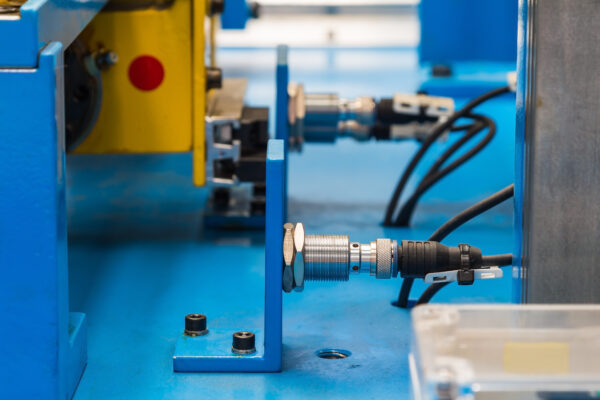 Inductive proximity sensor or proximity switch installed on the machine